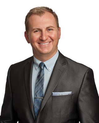Portrait of Gregory Szewczyk, REALTOR®.